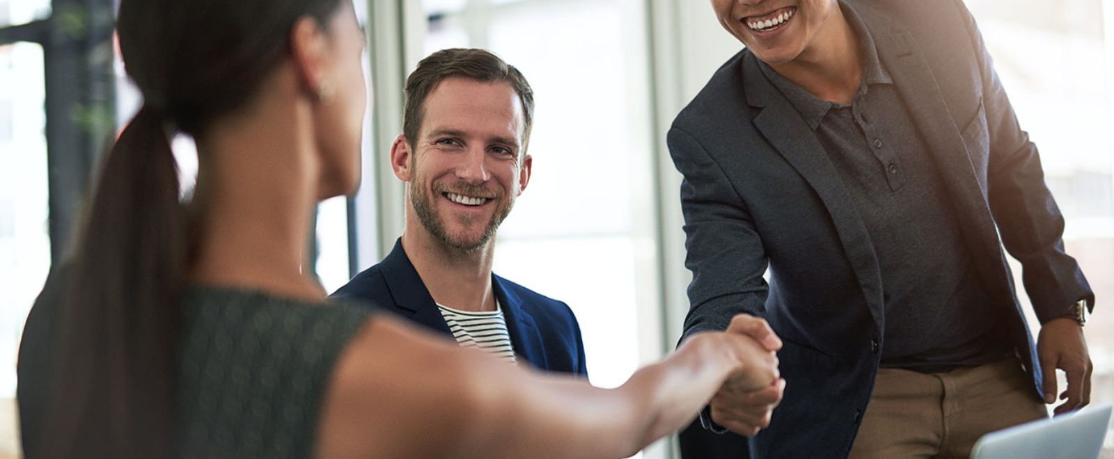 two people shaking hands